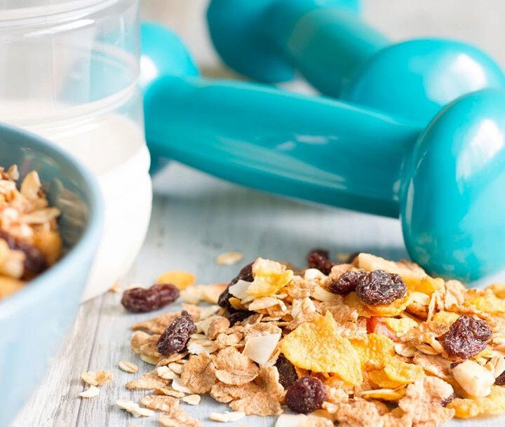 A close up of cereal and a dumbbell